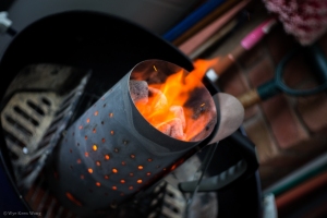 Flaming charcoal prepared for grill